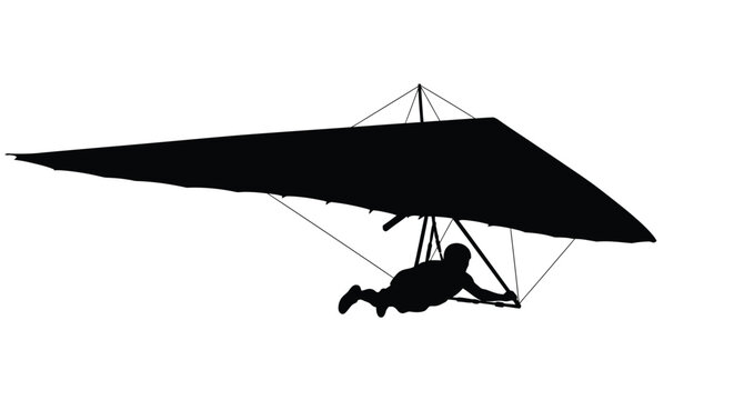 Black silhouette of a hang glider and pilot in flight silhouette