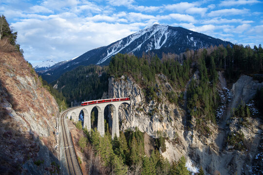 Train driving across the Landwasser Viaduct between Schmitten and Filisur, Graubunden, Switzerland