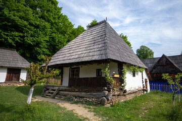 Fototapeta premium Astra National Museum Complex in the city of Sibiu, Romania. Picture of an old Romanian village with old dilapidated houses.