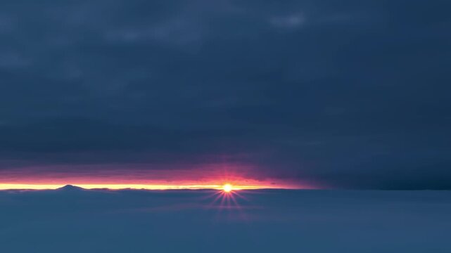 Colorful Sunset with Sun Shining Through Window in Clouds, Misty Evening Timelapse