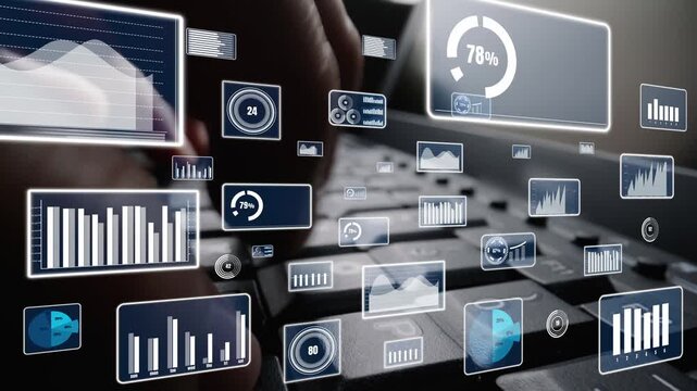 A close-up view of hands typing on a keyboard with floating digital graphics showing data analysis, statistics, and metrics to illustrate modern technology and workspace dynamics. Xenic