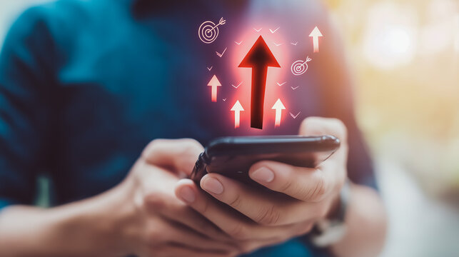 成功へと導く赤い矢印とスマホを用いたスマートな資産管理