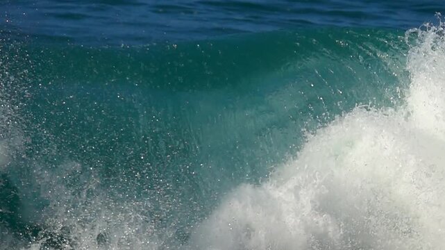 Wave green water splashing. Slow motion