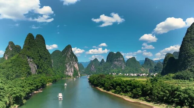 Scenic view of the li river surrounded by karst mountains in china.