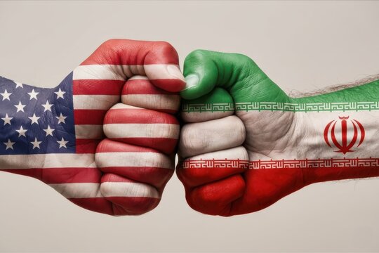 Hands showing flags of the United States and Iran bumping together in a symbolic gesture of unity or conflict