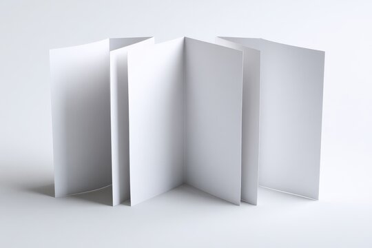 Blank eight-page double gate fold brochure displayed in closed and semi-open states for presentation design on a clean white surface