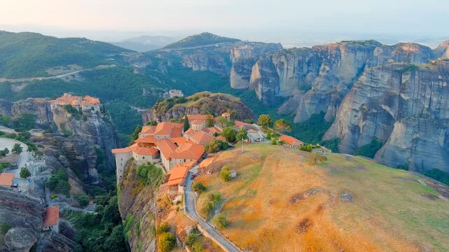 Meteora, Kalabaka, Greece. Monastery of the Transfiguration of the Saviour. Meteora - rocks, up to 600 meters high. There are 6 active Greek Orthodox monasteries listed on the UNESCO list. Drone foot