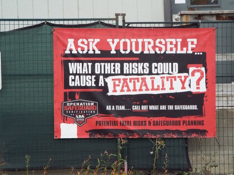 Ottawa, Ontario, Canada &ndash; July 23, 2026: An "Operation Safeguard safety banner" on a fence prompts workers to identify potential fatal risks on Byron Avenue.