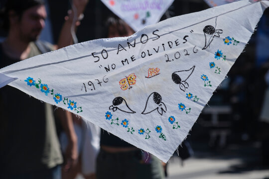 White scarf, Argentine symbol of the struggle of the Mothers of Plaza de Mayo since the dictatorship. 