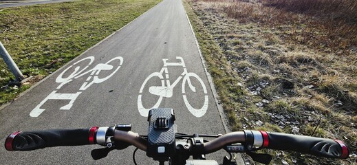 a bicycle on the road on a bike path rower w trasie na ścieżce rowerowej Brwinów © mobile