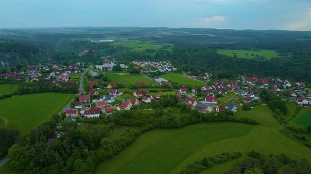 Aerial view of the city Pottenstein in Germany, Bavaria on a cloudy day in Spring
