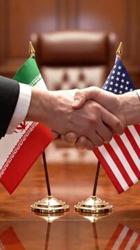 Diplomacy handshake motion between united states and iran representatives concluding important international political agreement footage