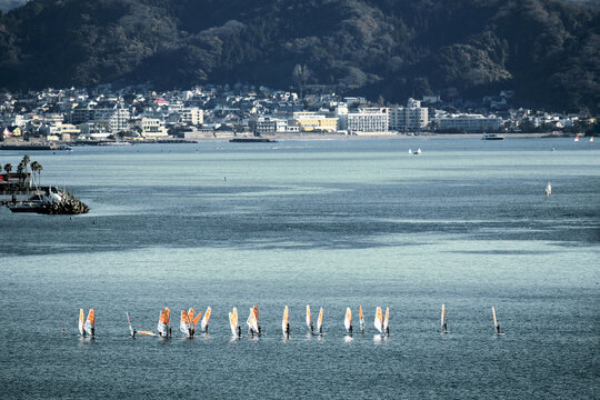 Windsurfers Practicing in Sagami Bay off Koshigoe Beach, Viewed from Enoshima Island, Kamakura, Japan