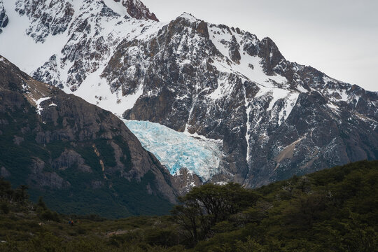 Piedras Blancas hanging glacier and snowy mountains in El Chalten