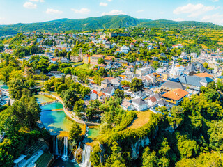 Pliva waterfall in Jajce, Bosnia and Herzegovina. Scenic place and viewpoint historical town castle on hill. © Zedspider