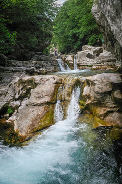 Swimming in Loup River gorges during a sunny day in Provence-Alpes-Cote d'Azur region in southeast France for outdoor adventure