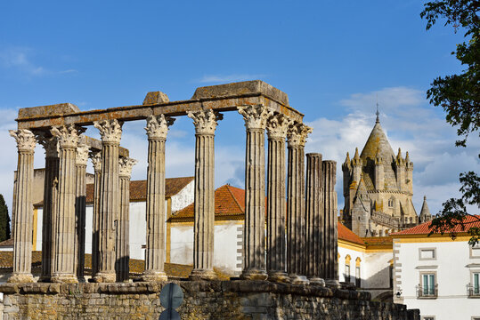 Roman Temple of Evora stands tall against the sky in the Alentejo region of Portugal showcasing its historic architecture and surroundings