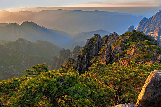 Daybreak reveals mountains and trees in Huangshan, Anhui Province, China