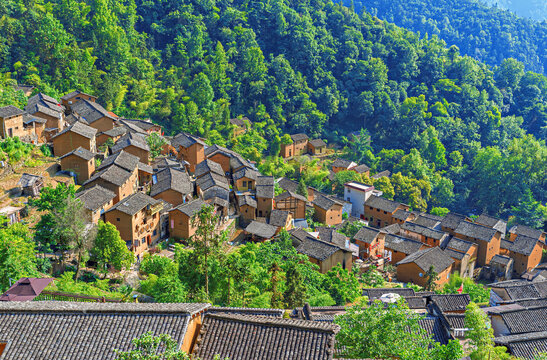 Ancient earthen buildings of YangChan Tulou village in Huangshan, Anhui Province, China are over 400 years old and surrounded by mountains