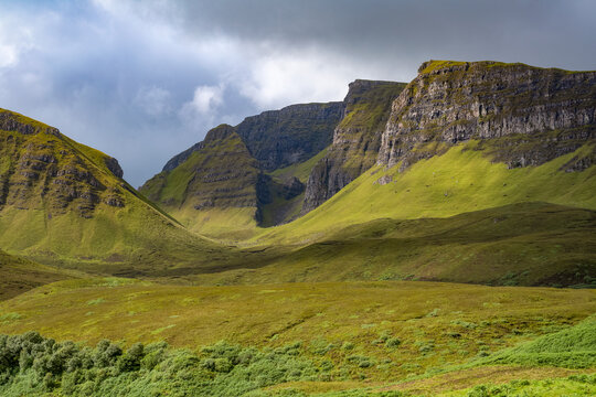Rugged hills of Trotternish escarpment on the northern peninsula of Isle of Skye showcases natural beauty and dramatic landscapes