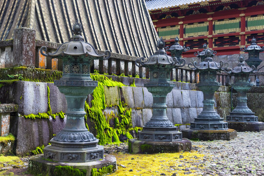 Mausoleum of Iemitsu stone lanterns at Rinnoji Temple in Nikko Tochigi Japan with moss and stone features