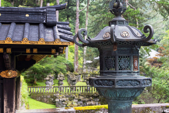 Stone lantern at Mausoleum of Iemitsu in Rinnoji Temple features intricate design and rich history in Nikko Tochigi Japan