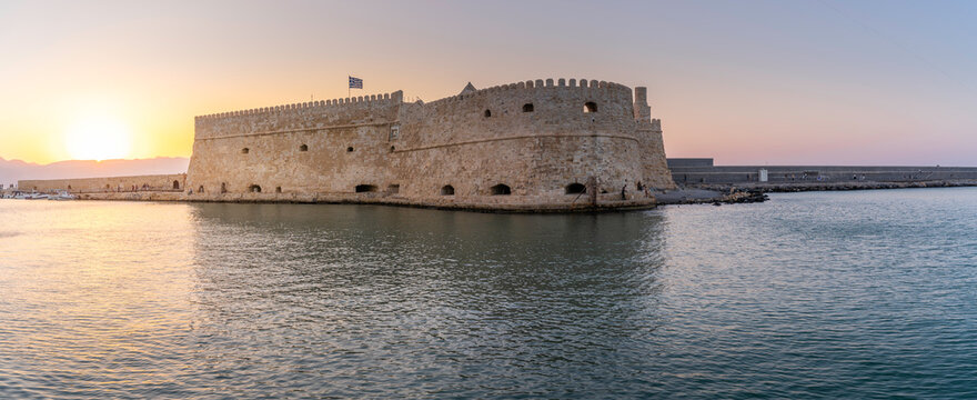 Koules Venetian Fortress stands at sunset in the City of Heraklion, Crete, showing the beauty of Greek architecture and history