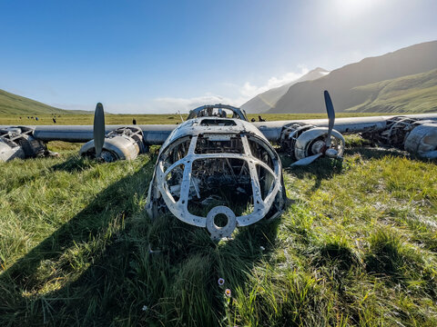 Grounded B-24 Liberator bomber wreckage in Bechevin Bay, Atka Island, during WWII