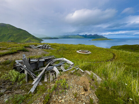 Remains of World War II gun emplacement at Dutch Harbor in Unalaska, Alaska by the water and mountains