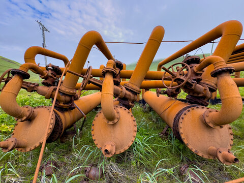 Rusty fuel pumps at Sand Bay Naval Station on Great Sitkin Island in Alaska from World War II era