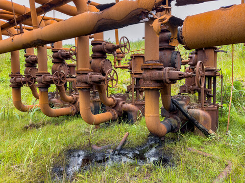 Rusty fuel valves and pipes from Sand Bay Naval Station on Great Sitkin Island in Alaska during World War II