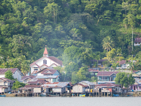 View of village buildings and church in Kokas, a Muslim-majority area on Papua island in Indonesia