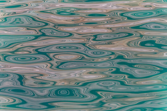 Reflections of colors and patterns on the water at Punta Colorado in the Gulf of California, Baja California Sur, Mexico