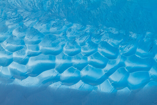 Detail of blue ice around the Antarctic Peninsula during the Austral summer months in Antarctica showing different ice formations
