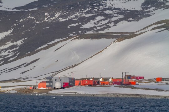 Views of the research station on King George Island in Antarctica surrounded by mountains and ocean