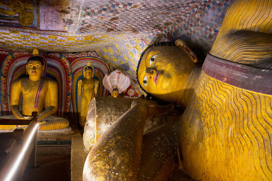 Buddha statues and murals inside Dambulla Cave Temple in Sri Lanka capture rich cultural history and artistry