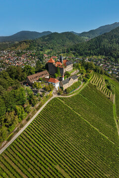 Visit Schloss Eberstein Castle in the Murgtal Valley near Gernsbach, Germany with vineyards and mountains