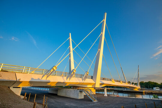 Renfrew Bridge features twin-swing design and cable-stayed structure over water in Glasgow Scotland