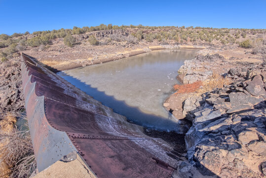 Historic Bainbridge Steel Dam overlooks the reservoir near Ash Fork Arizona in the Kaibab National Forest
