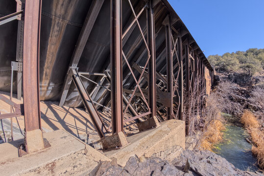 Closeup view of the steel framework of Bainbridge Steel Dam built in the late 1800s located in Kaibab National Forest near Ash Fork Arizona
