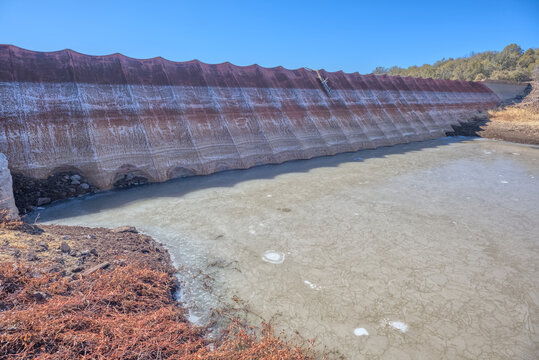 Historic Bainbridge Steel Dam structure near Ash Fork Arizona is a preserved landmark from the late 1800s