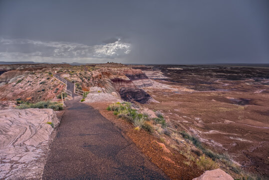 Storm clouds gather over Blue Mesa in Petrified Forest National Park Arizona just before a rainstorm