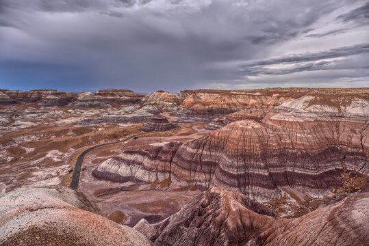Storm clouds gather over Blue Mesa in Petrified Forest National Park Arizona as weather changes