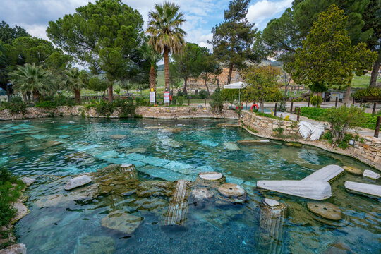 Visit Cleopatra antique pools in Pamukkale Turkey for a unique experience in nature and history
