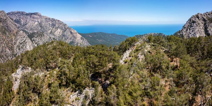 Drone view capturing mountains and coast in Antalya, Turkey, highlighting natural features and landscape