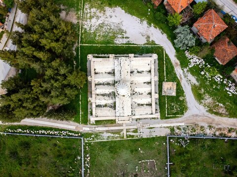 Bird's eye view of Suruz Caravanserai in Turkey showing its structure and surroundings during daylight