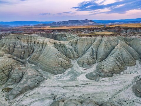Colorful mountains at sunset captured from a drone view in Turkey showcasing natural formations and landscapes