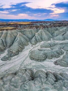Drone view of colorful mountains during sunset in Ankara, Turkey, showcasing unique geological formations and natural patterns