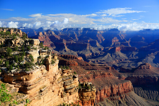 Views of the Grand Canyon showing rock formations and cliffs during daylight hours from the South Rim in Arizona
