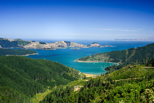 Scenic view of hills and waters in Marlborough Sounds showcases nature in South Island, New Zealand during clear weather
